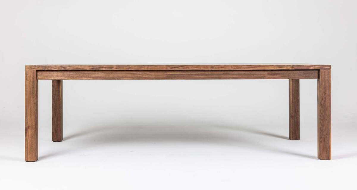 Timeless Parsons table design walnut crafted from solid wood, combining style and functionality for modern dining.